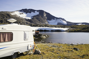 Camper lake and snow