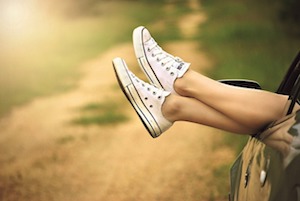 feet out window sneakers